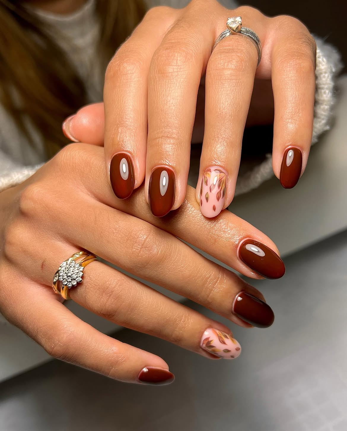 Rich Chocolate Brown Oval Nails with Leaf Art