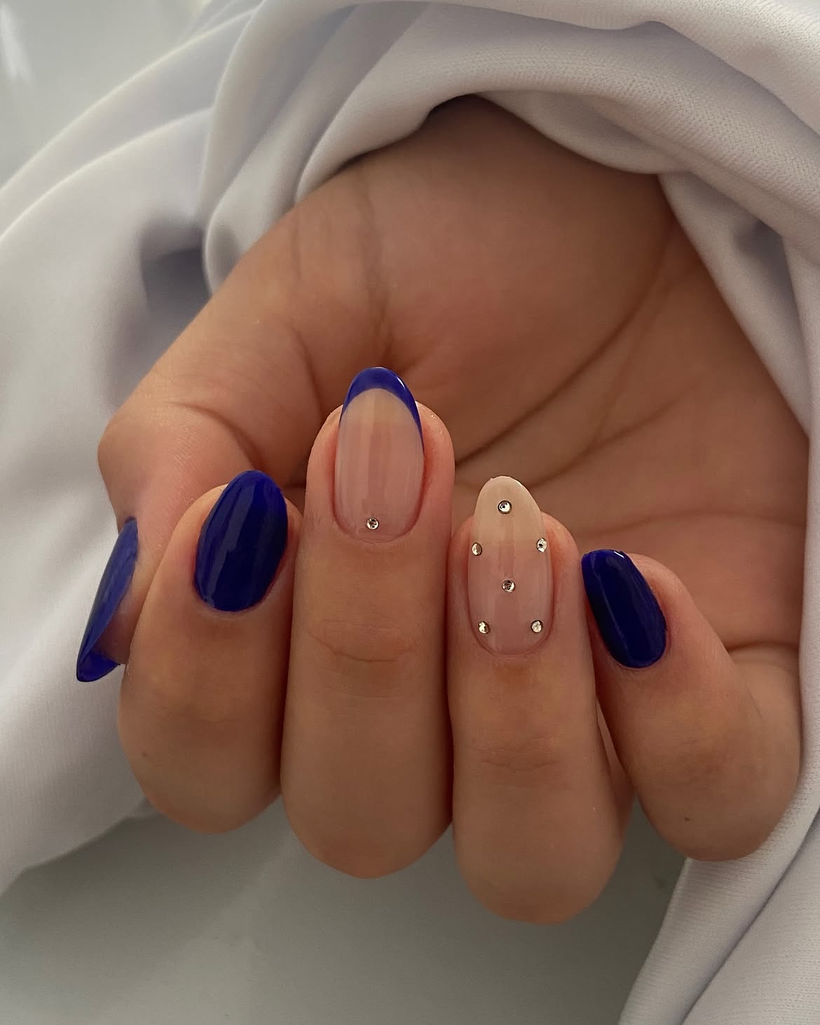 Royal Blue French Tip Almond Nails With Jewels