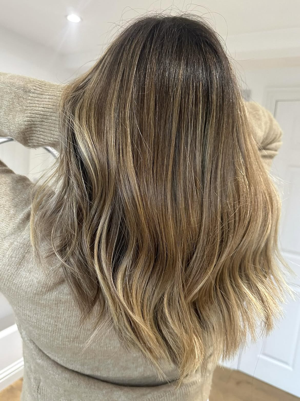 Sandy Blonde Balayage With Soft Beach Waves