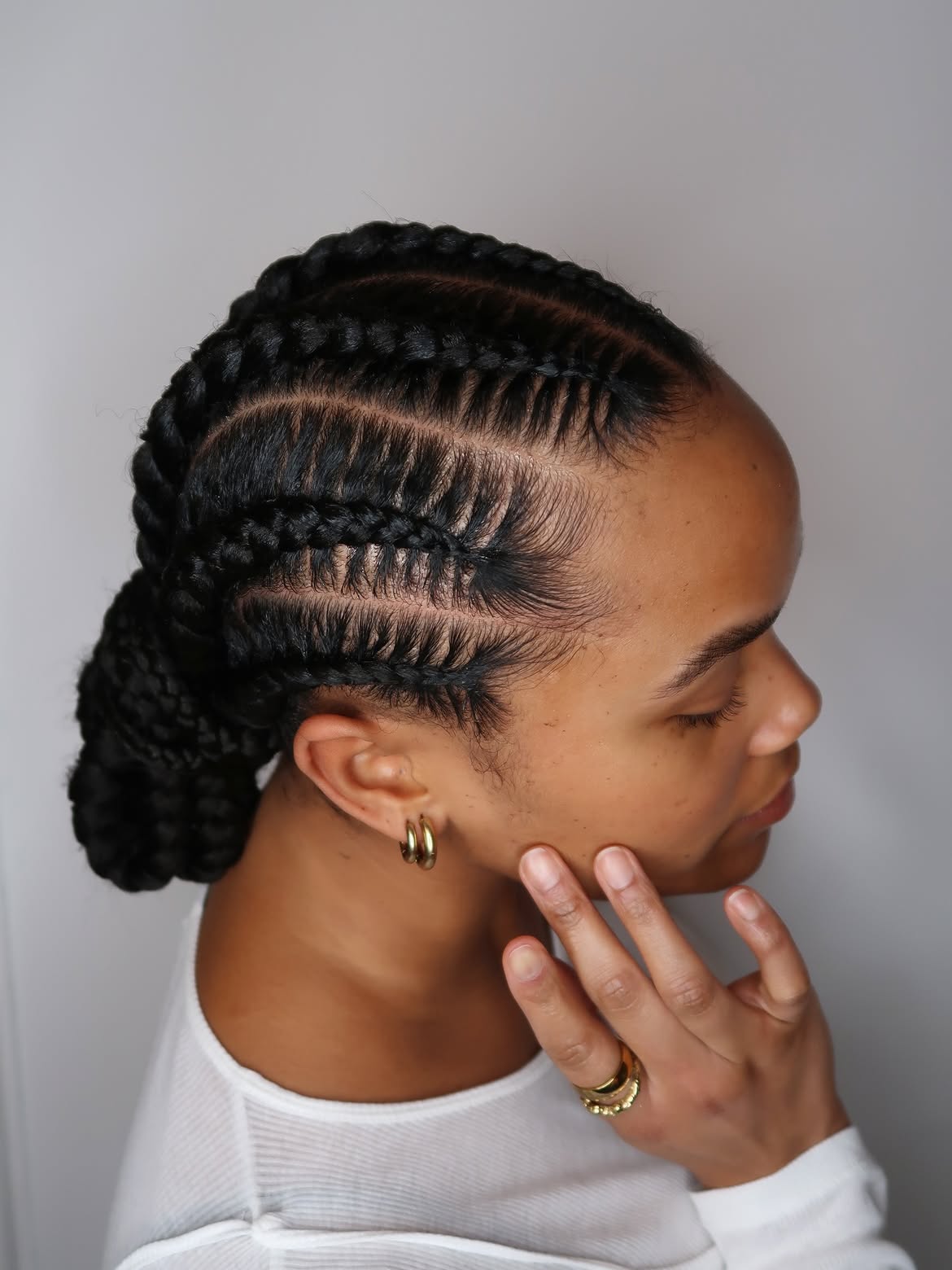Sleek Cornrows With A Low Bun