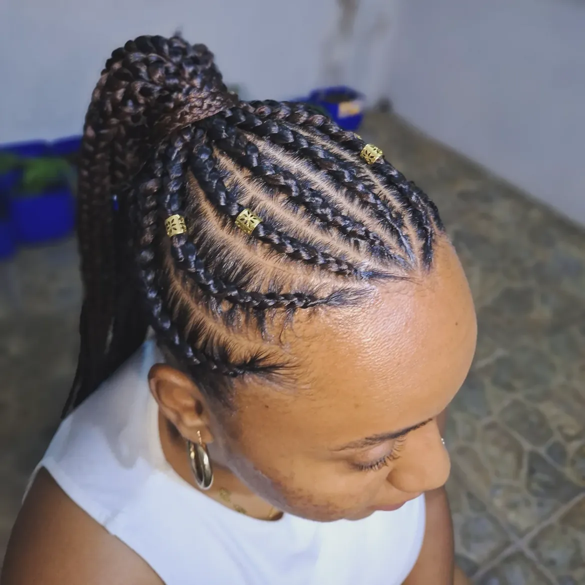 Sleek Cornrows With Gold Beads High Ponytail