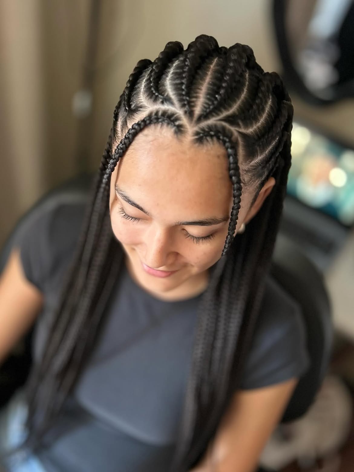 Sleek Fulani Braids With Face Framing Tendrils