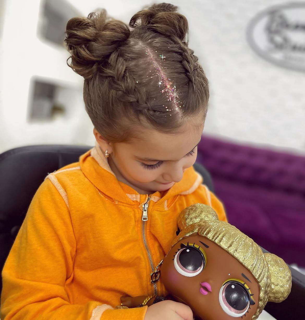 Sparkly Double Braids With Buns