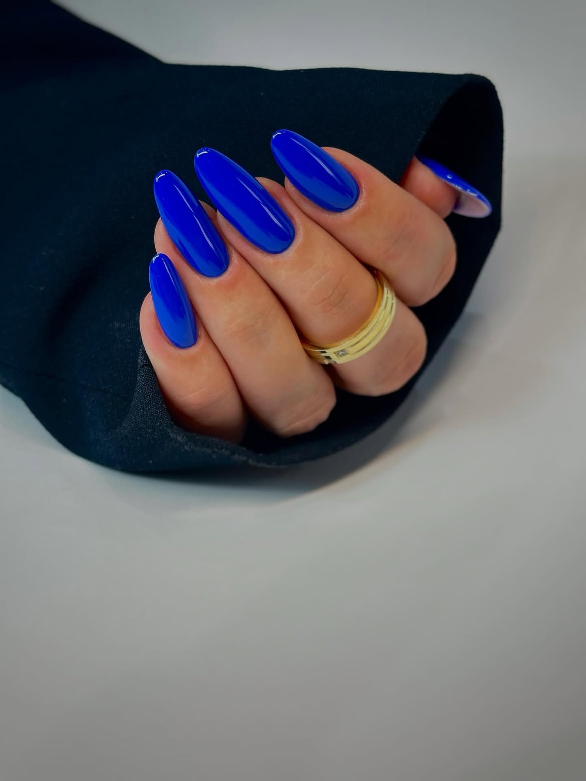 Vibrant Electric Blue Almond Shape Nails