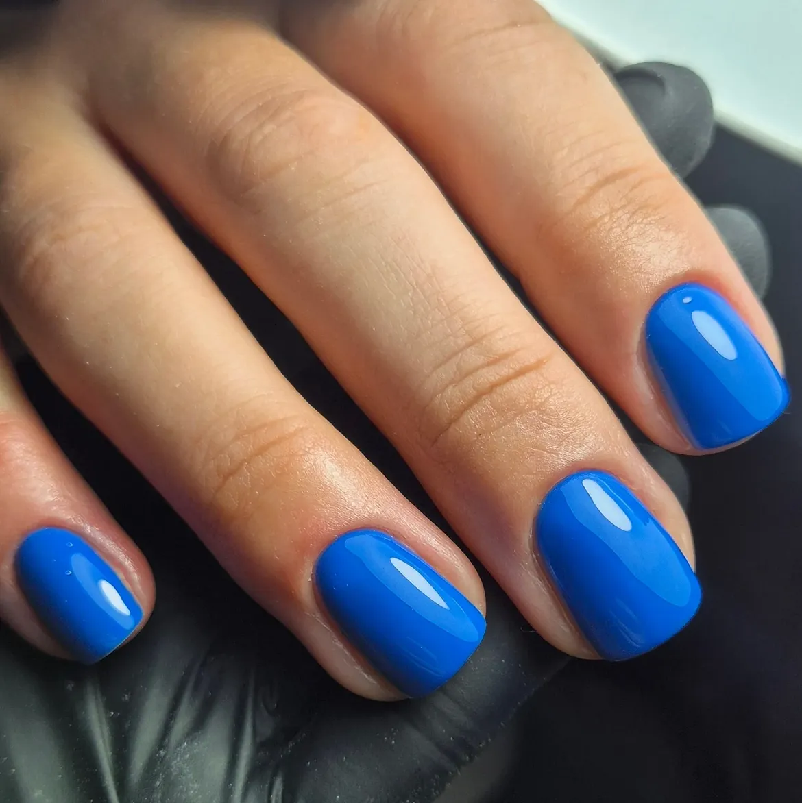 Vibrant Electric Blue Glossy Short Oval Nails