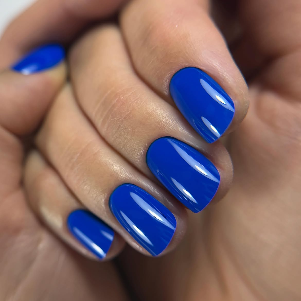 Vibrant Electric Blue Glossy Squoval Nails