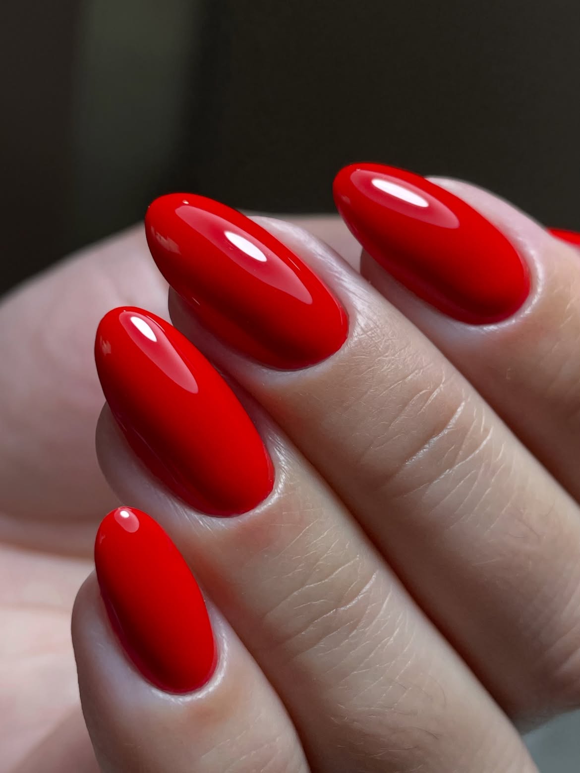 Vibrant Glossy Red Almond Nails