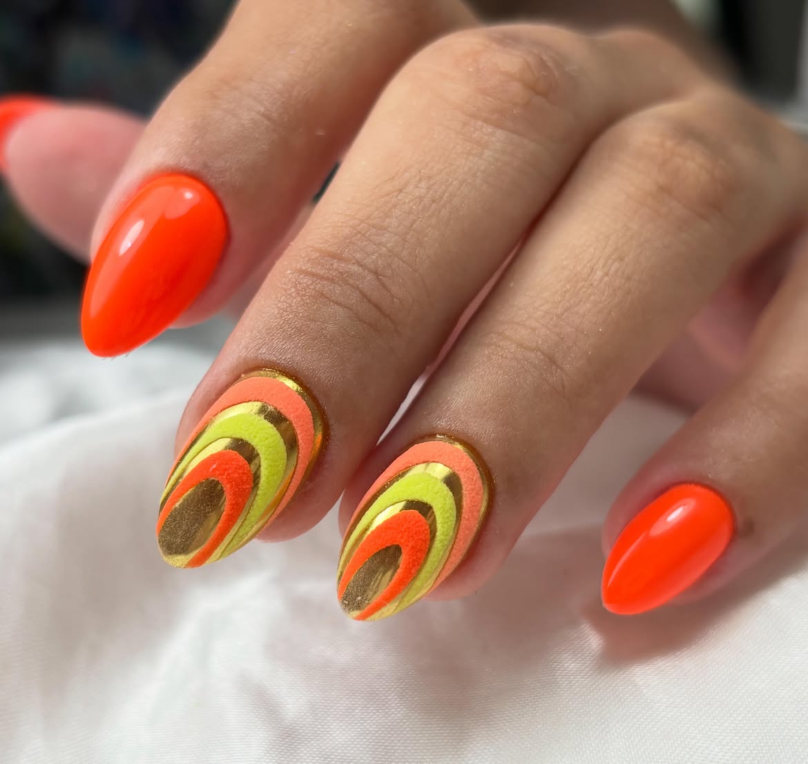 Vibrant Orange and Lime Swirl 3D Nails
