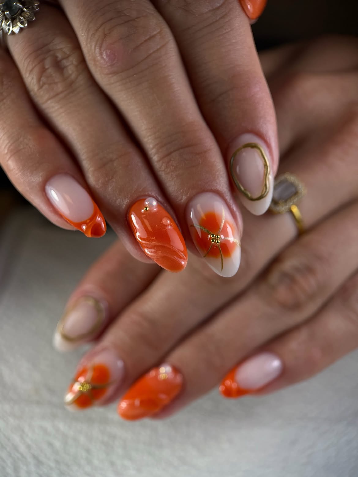 Vibrant Orange Floral Almond French Tips