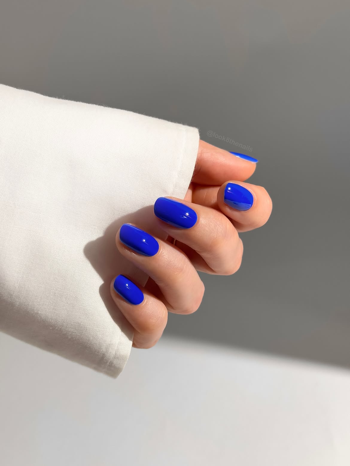 Vibrant Royal Blue Glossy Oval Nails