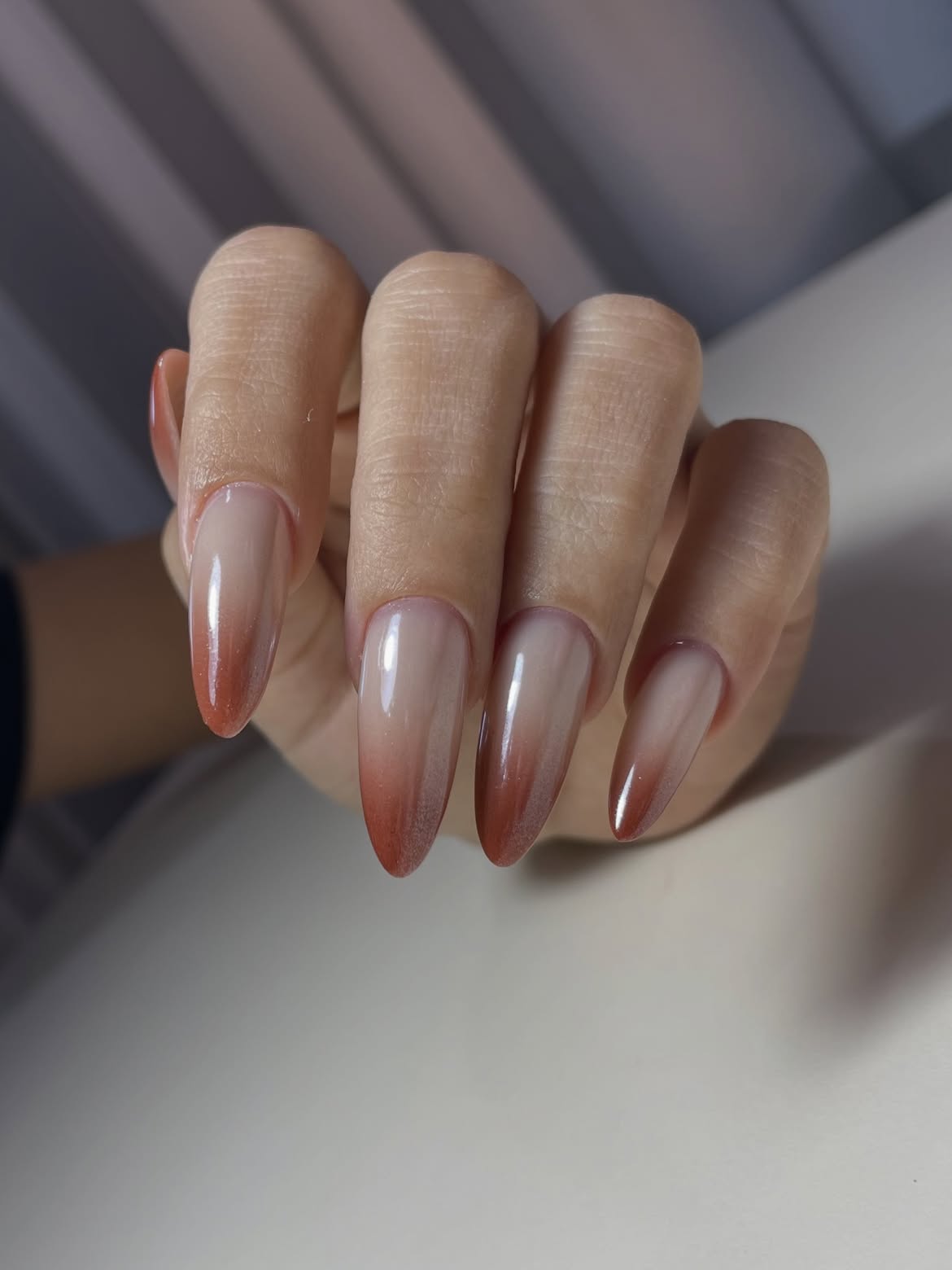 Warm Amber and Nude Ombre Almond Nails