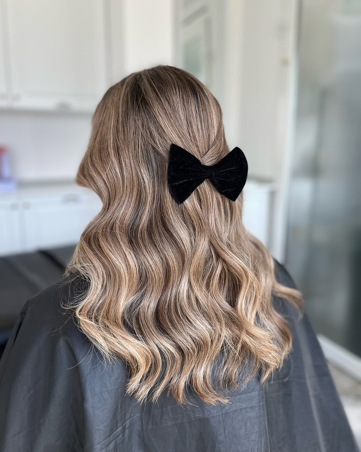 Warm Bronde Balayage With Loose Waves