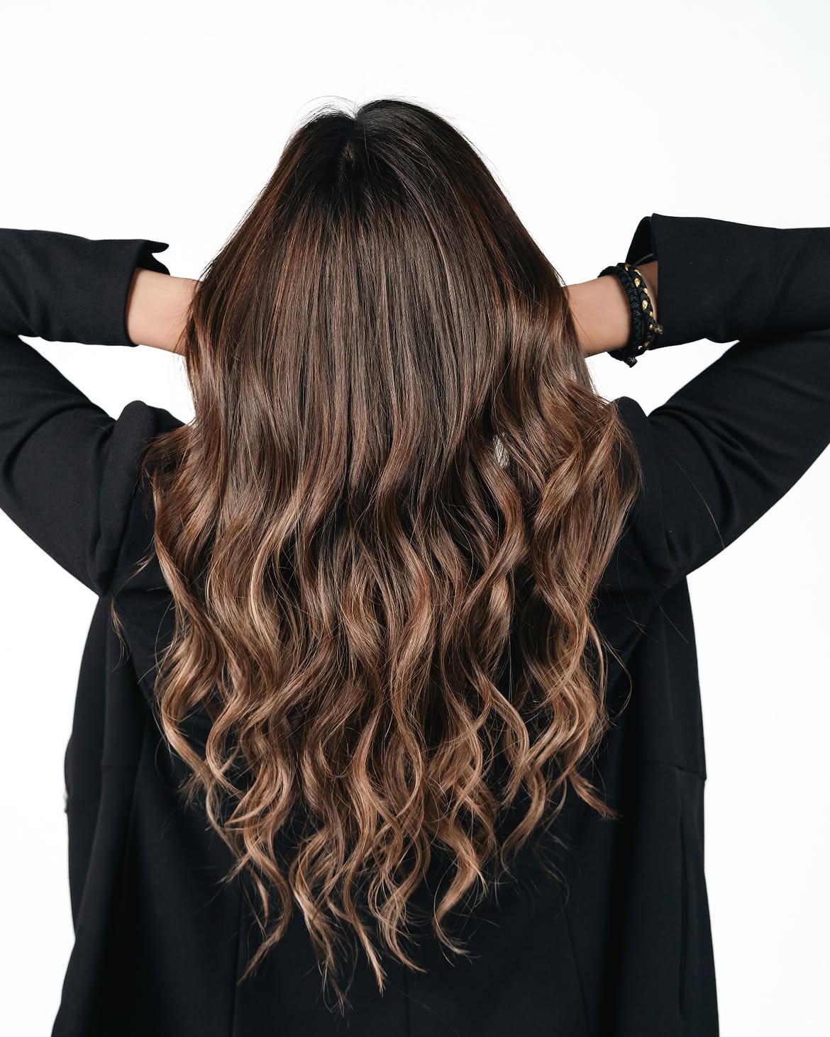 Warm Caramel Balayage On Long Brown Waves