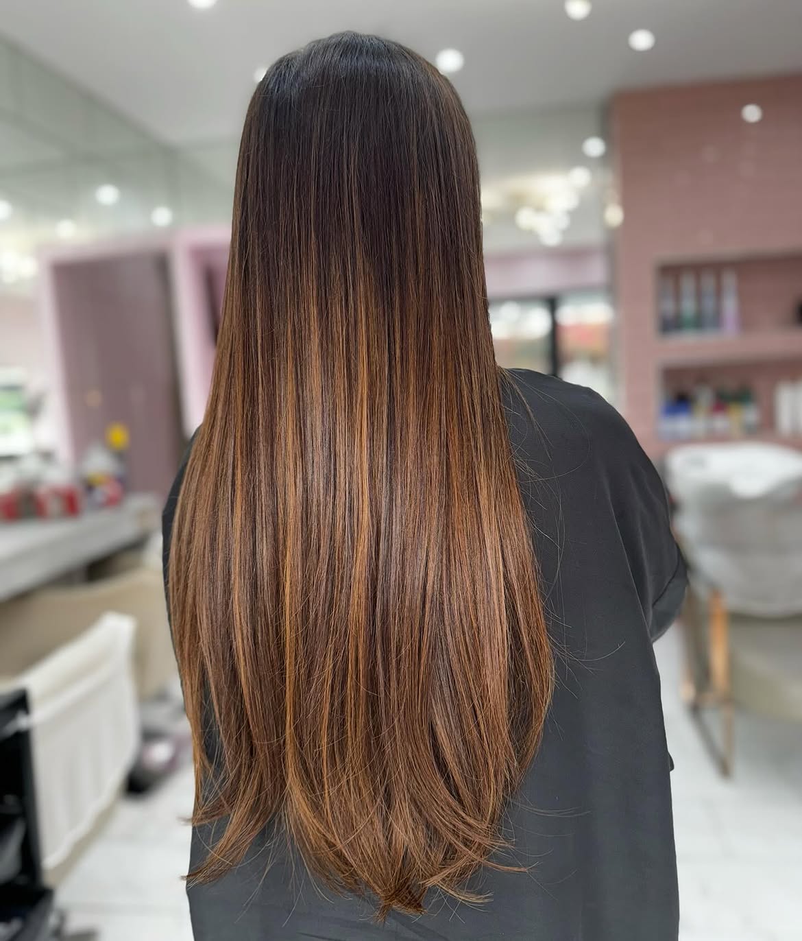 Warm Cinnamon Balayage On Long Layered Hair