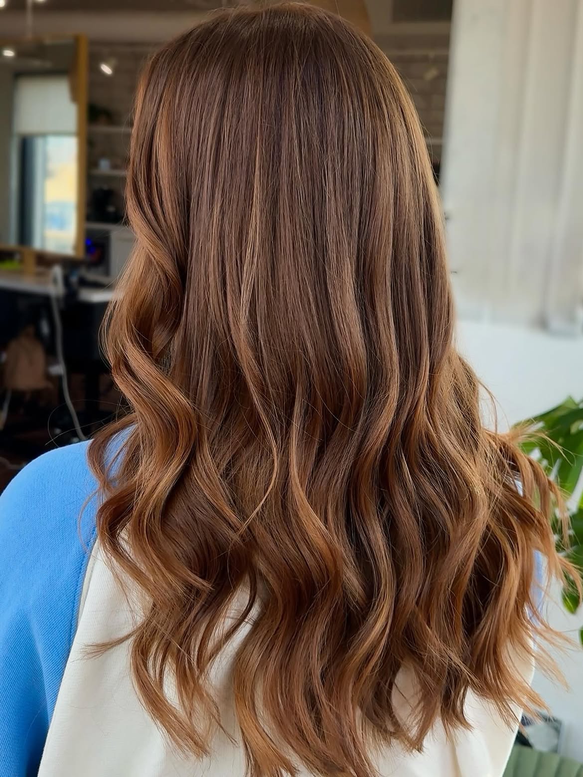 Warm Cinnamon Balayage On Wavy Brunette