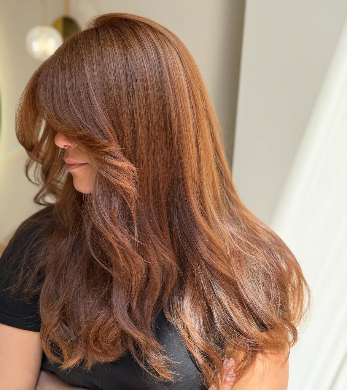 Warm Cinnamon Balayage With Face-Framing Layers