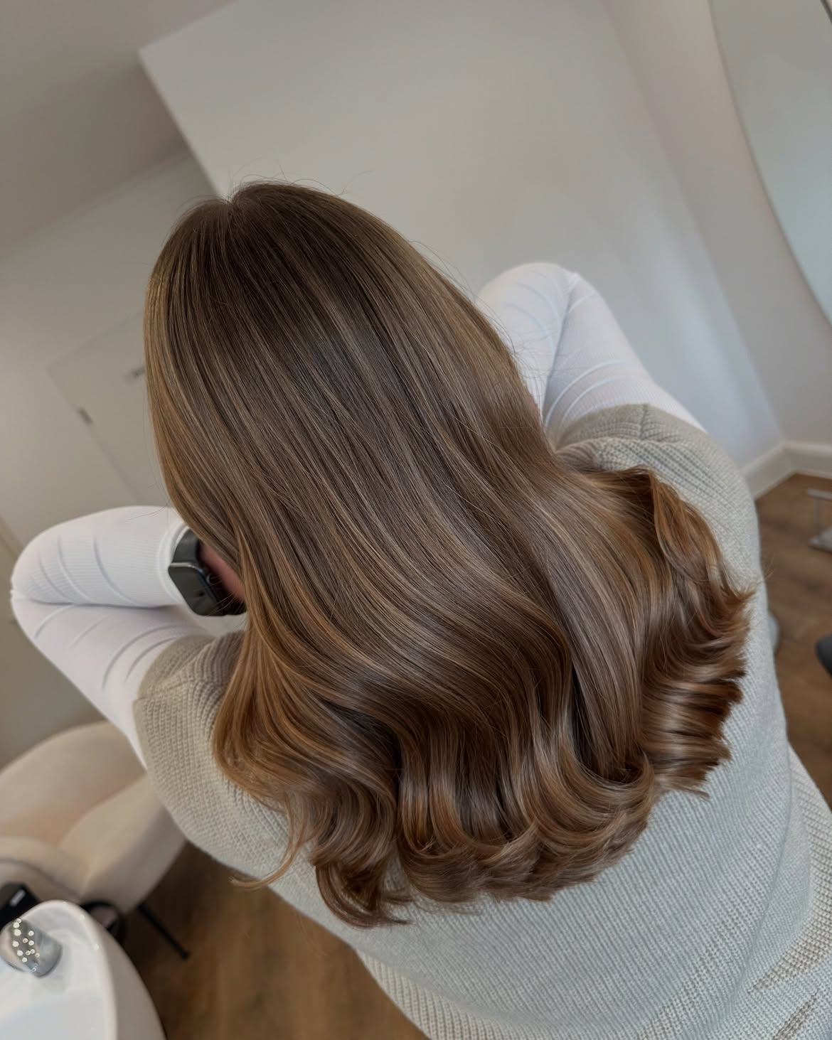 Warm Cinnamon Balayage With Soft Hollywood Waves