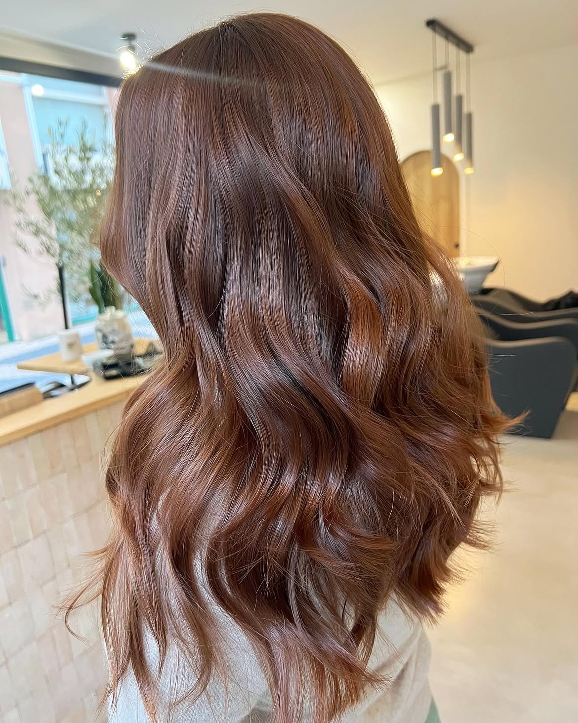 Warm Cinnamon Balayage With Soft Waves