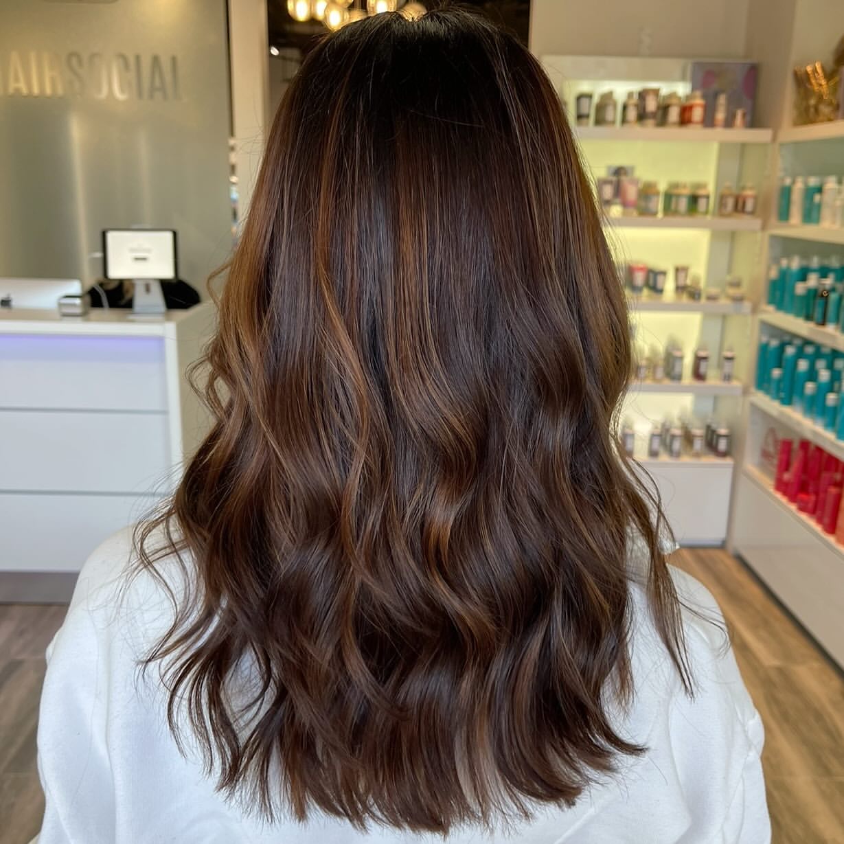 Warm Cinnamon Highlights On Dark Brown Waves