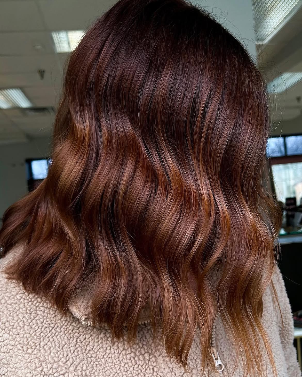 Warm Copper Balayage On Dark Auburn Waves