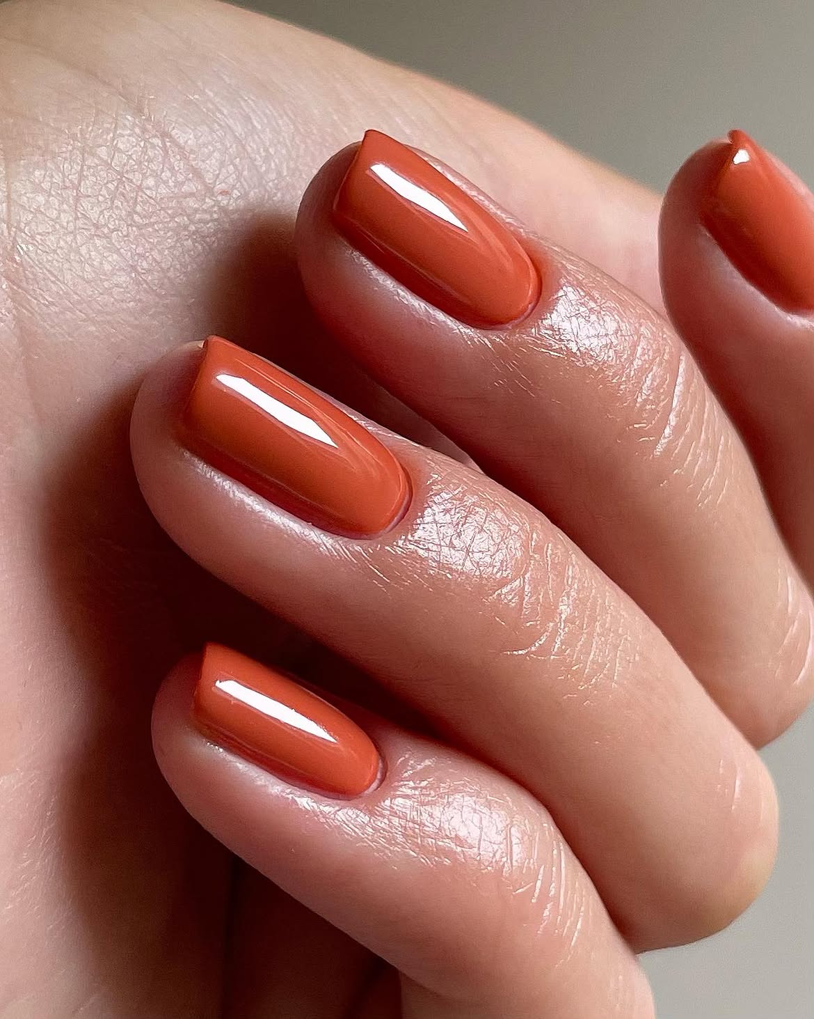 Warm Terracotta Glossy Oval Nails