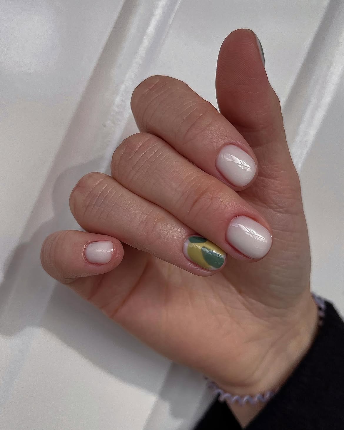 Abstract Swirl Milky White and Olive Green Nails