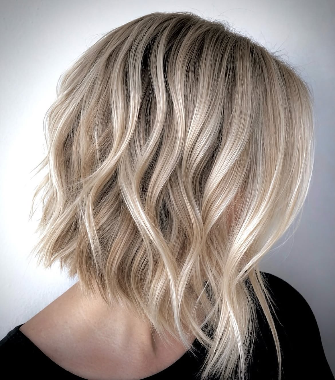 Beachy Blonde Inverted Bob With Textured Waves