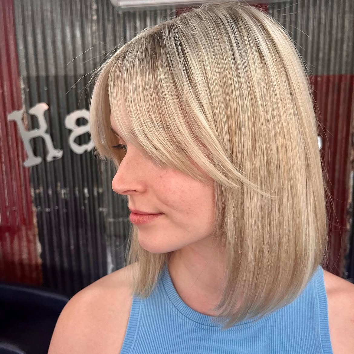 Blonde Collarbone Length Lob With Side Swept Bangs