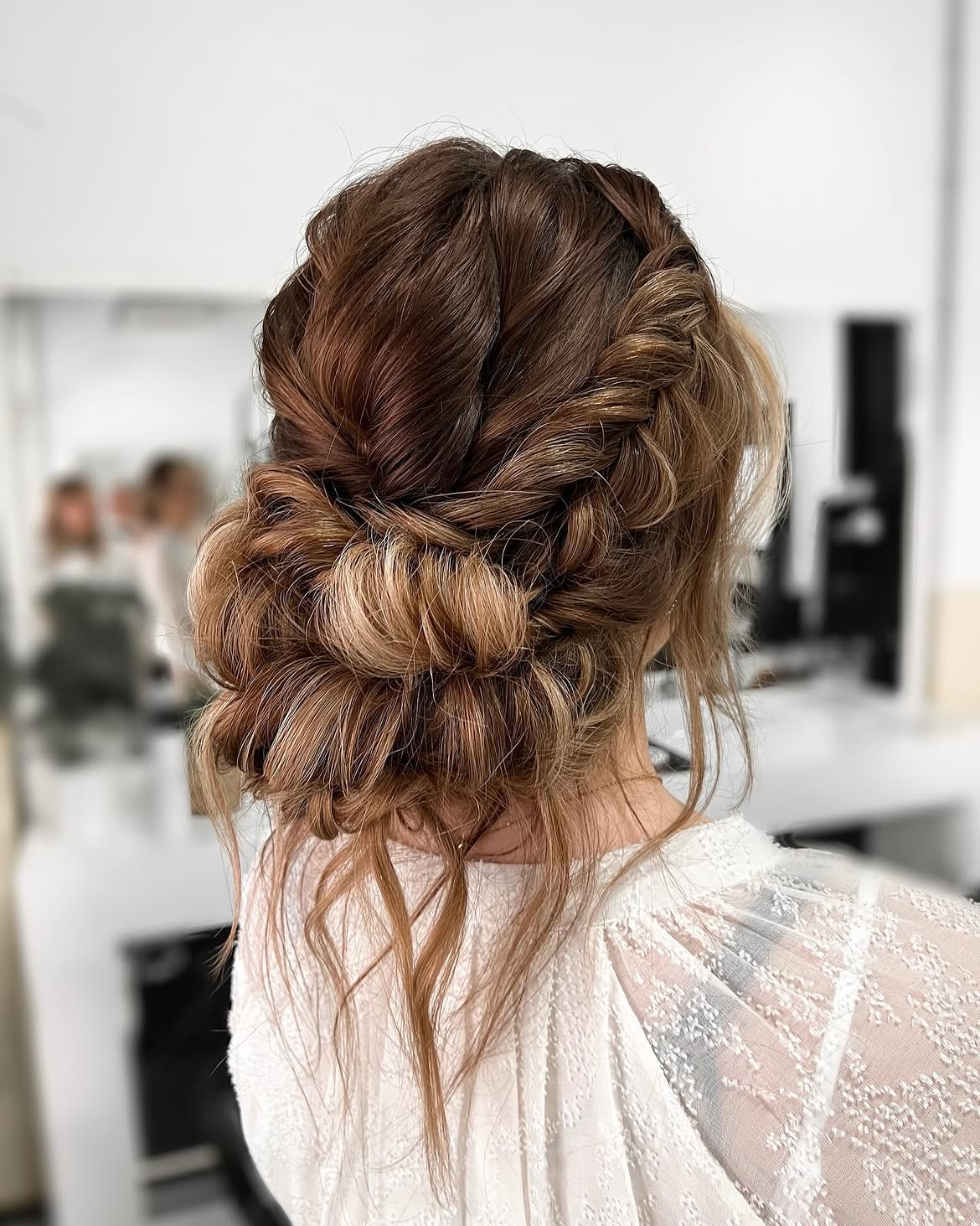 Bohemian Braided Updo With Loose Tendrils