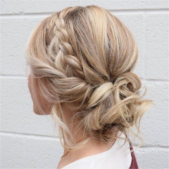 Braided Crown Messy Bun With Loose Waves
