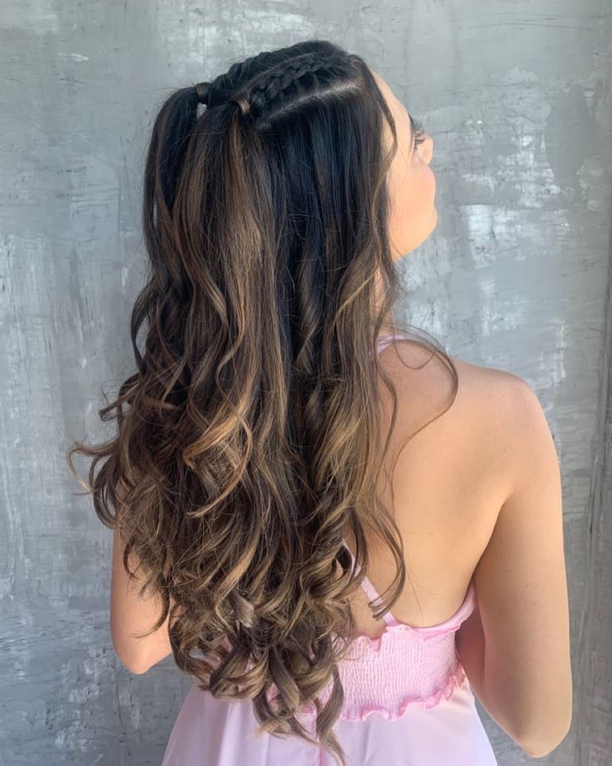 Braided Pigtails With Loose Curls For A Boho Vibe