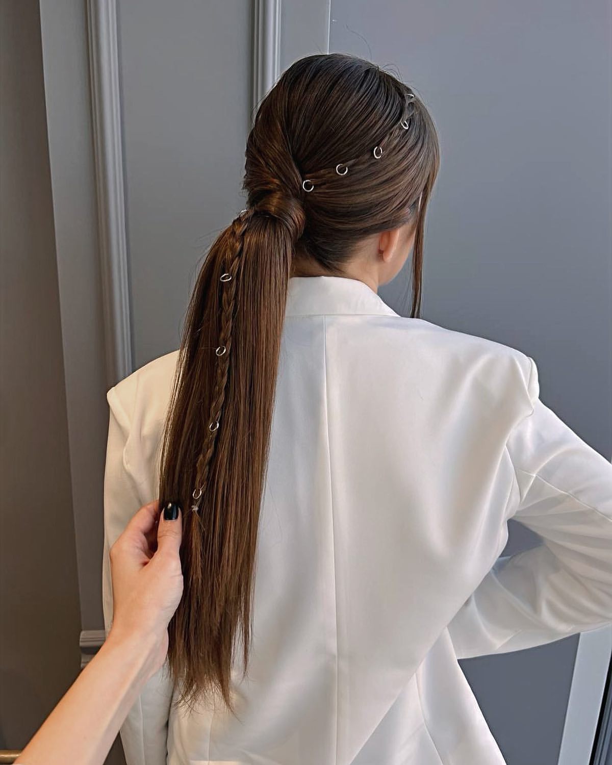 Braided Ponytail With Chic Ring Embellishments