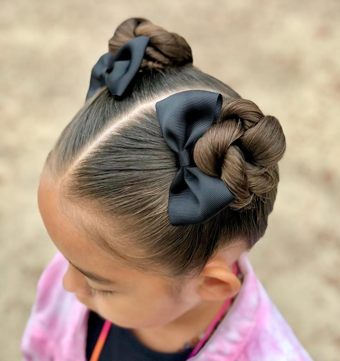 Braided Space Buns With Classic Black Bows