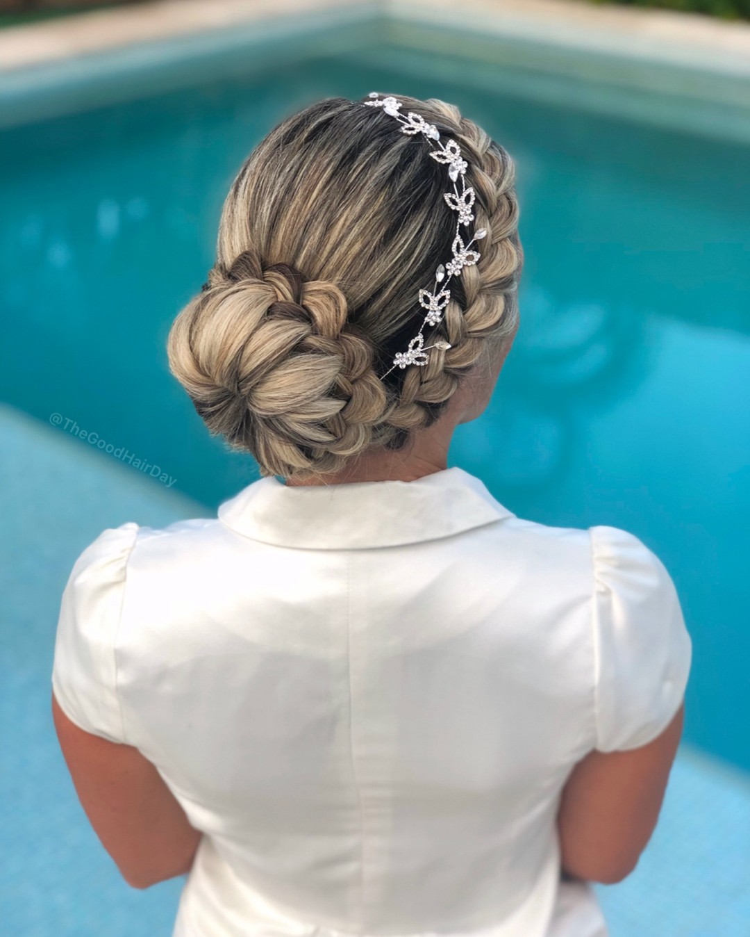 Braided Updo With Butterfly Hair Accessory