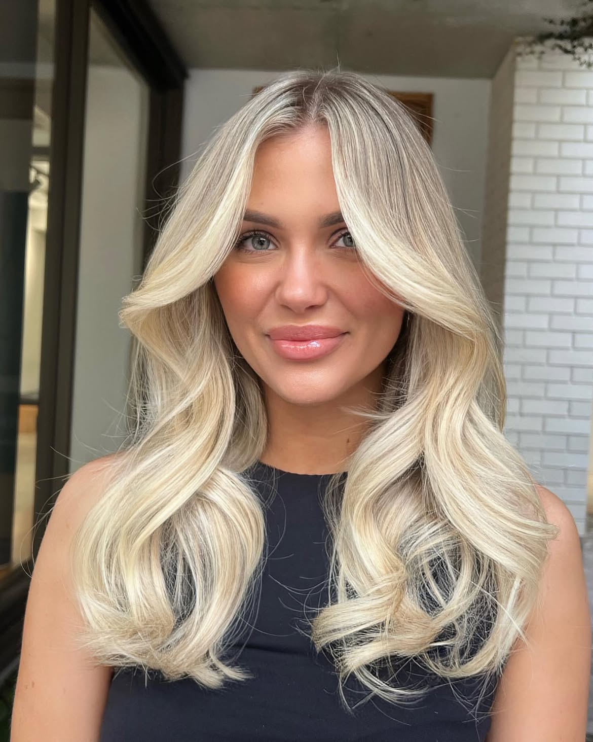 Bright Scandi Blonde Layers With Curtain Bangs
