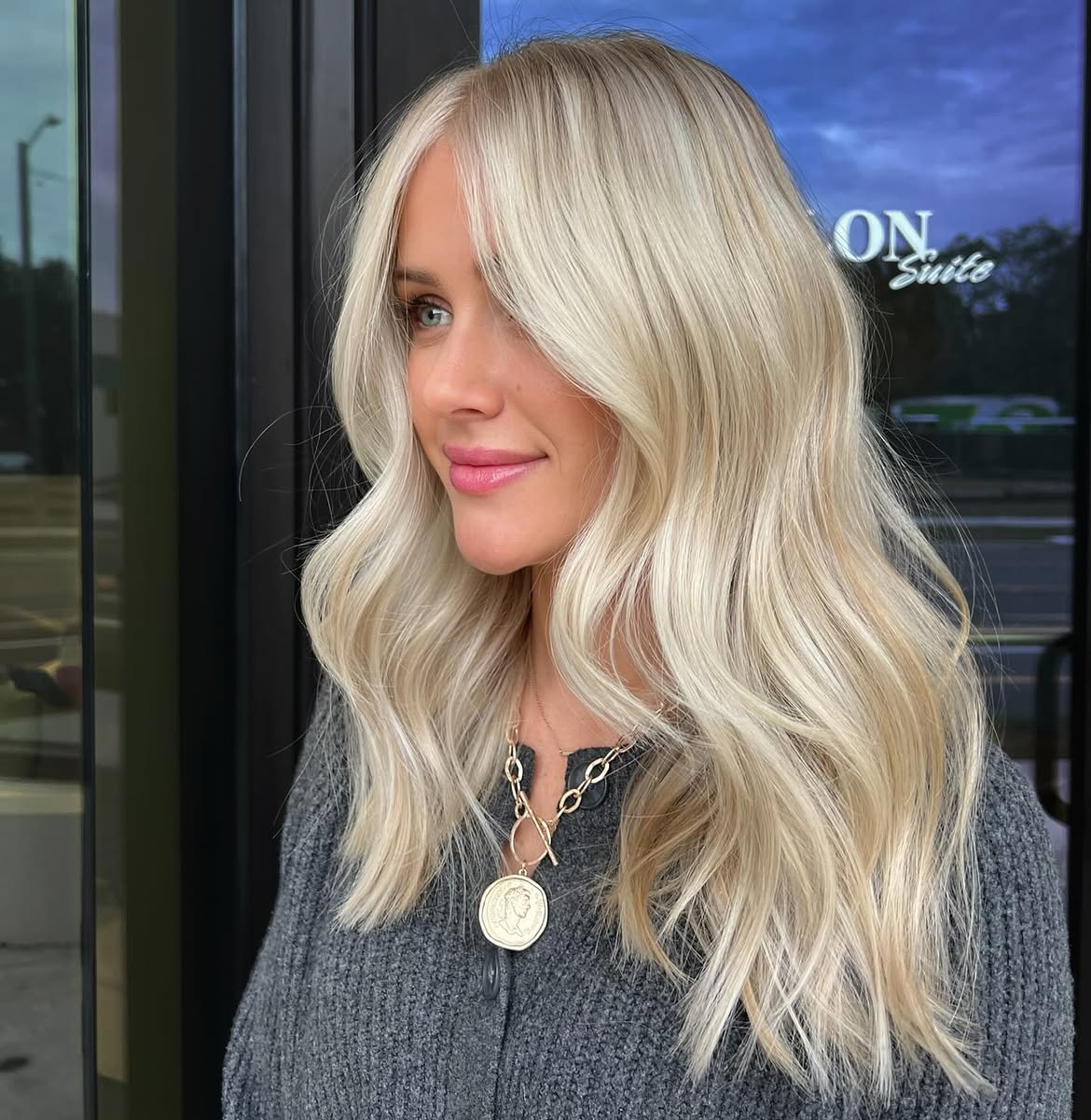 Bright Scandi Blonde With Face Framing Curtain Bangs