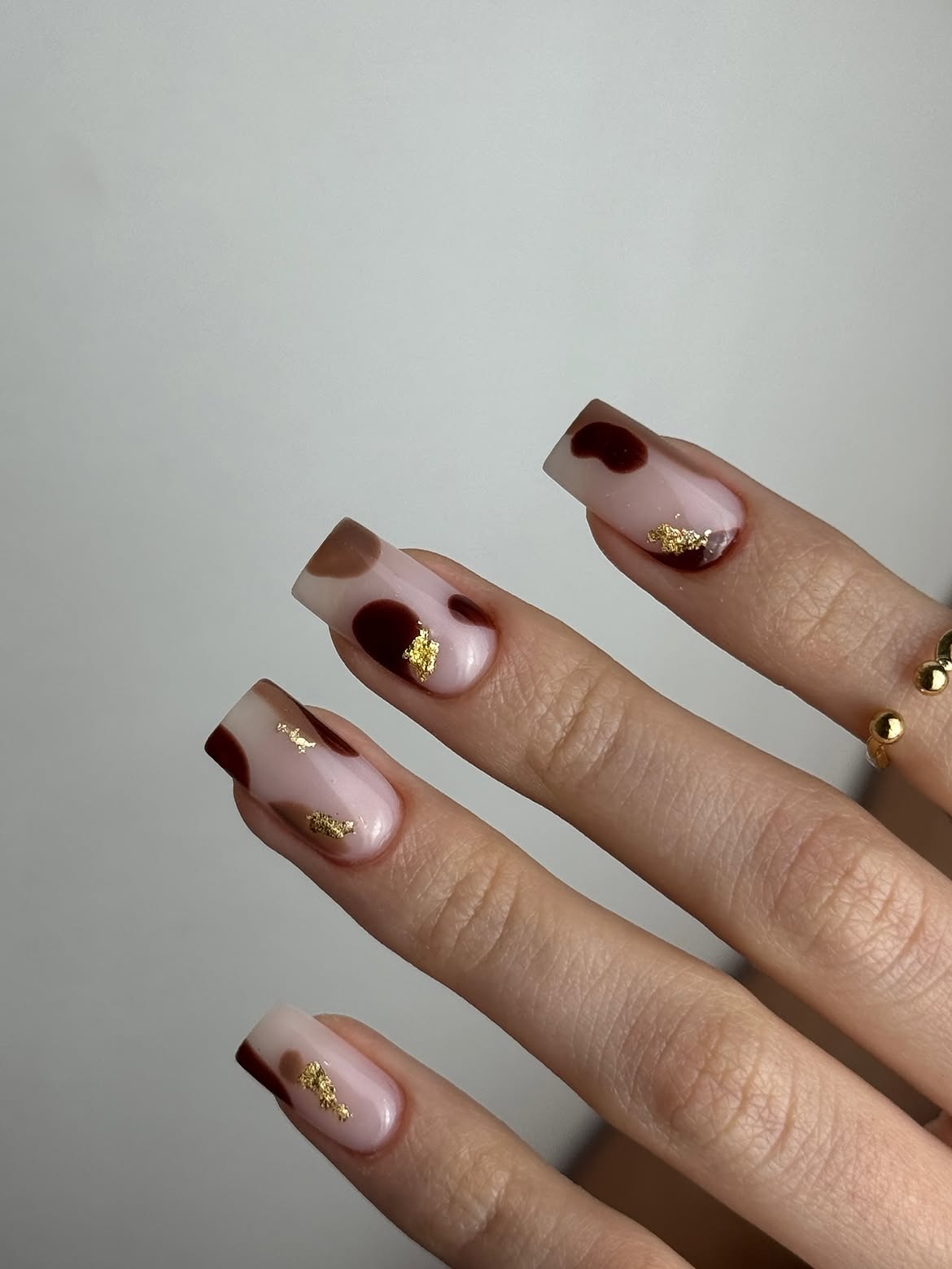 Brown and Burgundy Cow Print with Gold Flakes