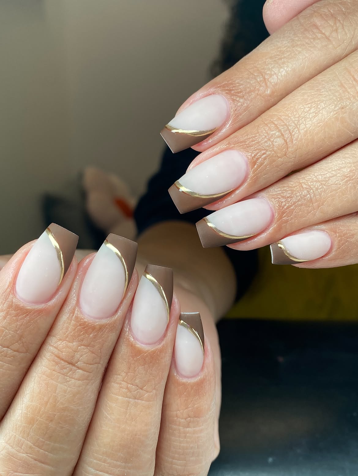 Brown and Gold French Tip Coffin Nails