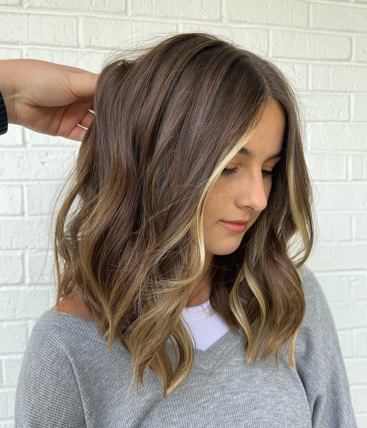 Caramel Blonde Money Piece On Wavy Lob