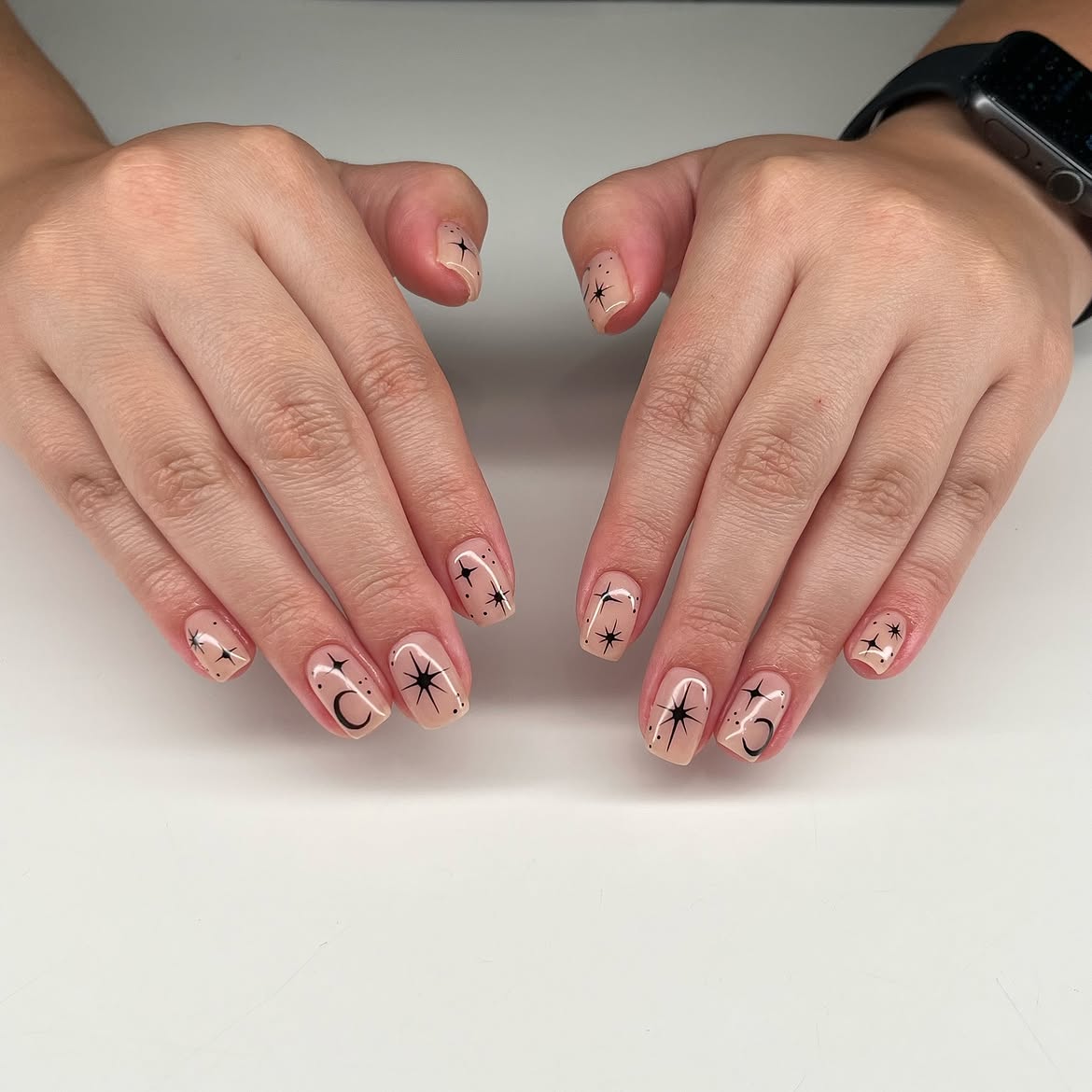Celestial Star and Moon Accents on Nude Nails