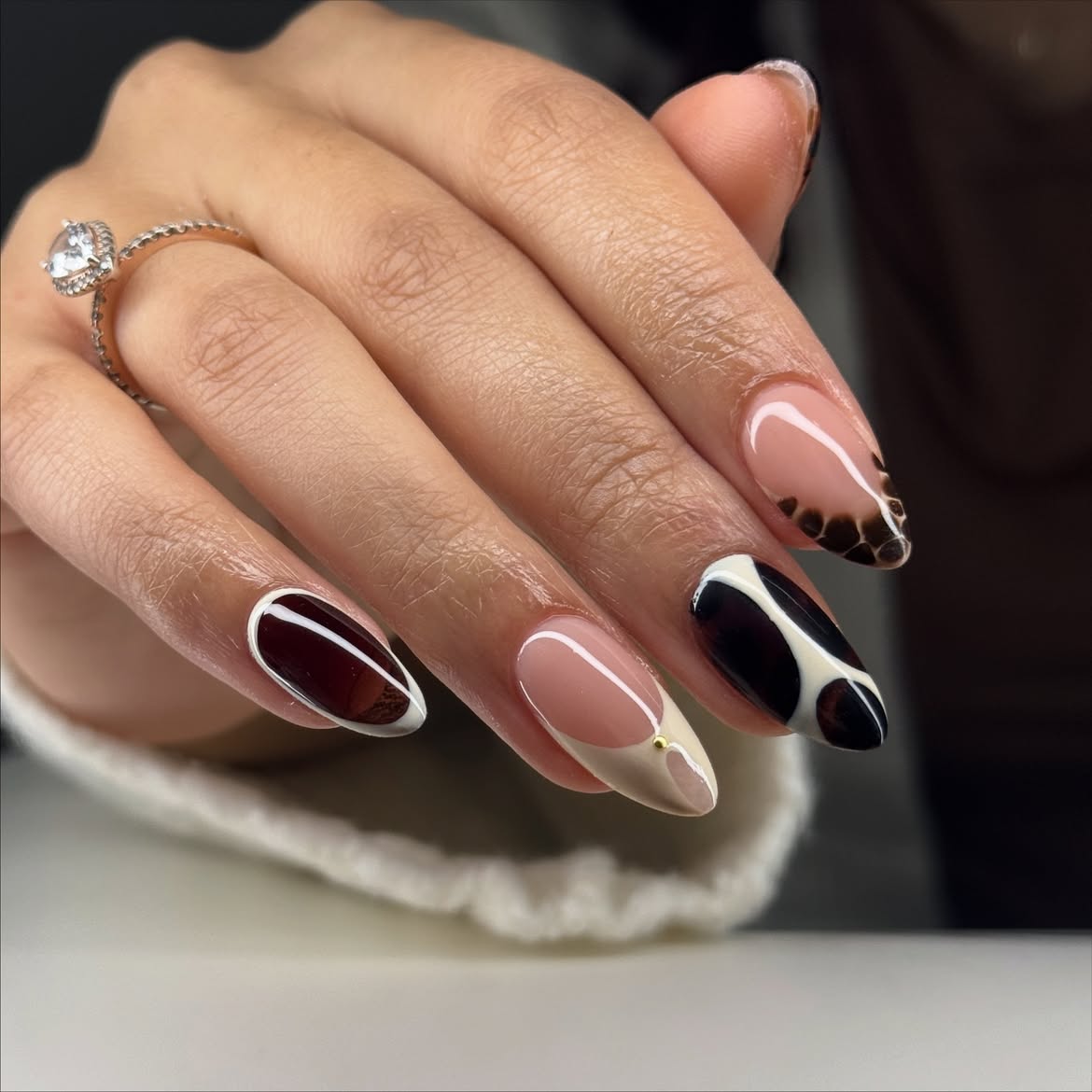 Chic Animal Print French Tip Almond Nails