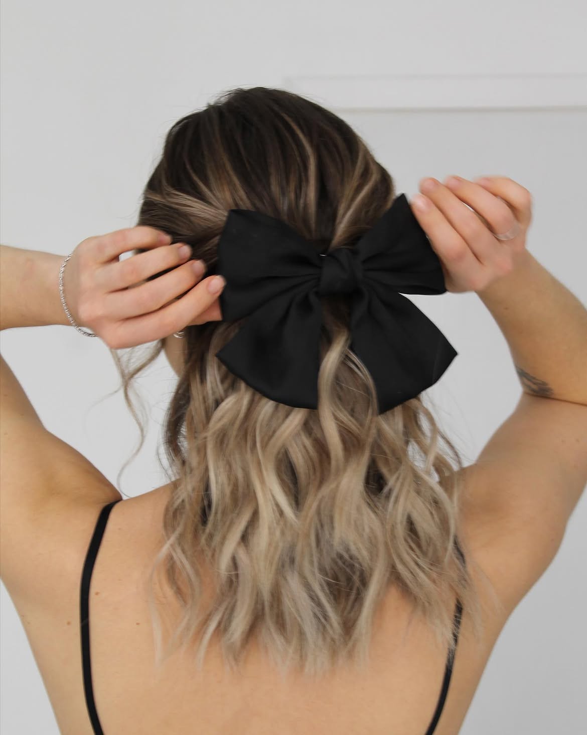 Chic Black Bow Half-Up Waves for Thanksgiving