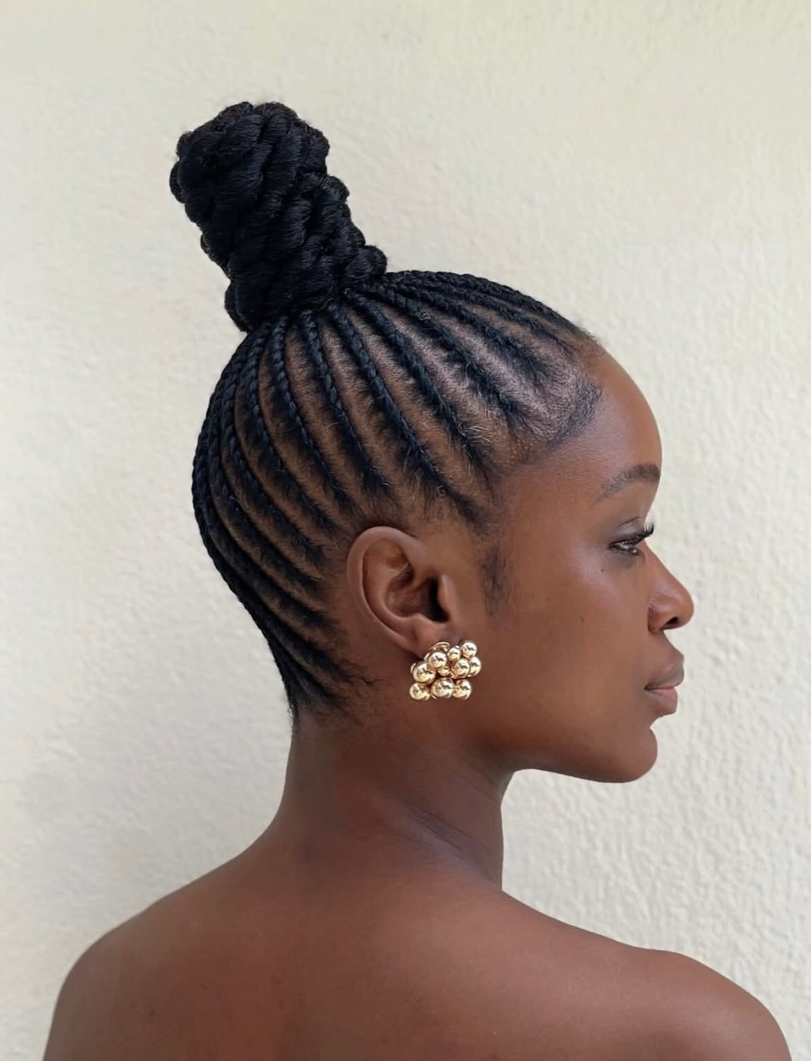 Chic Braided Top Knot With Sleek Cornrows