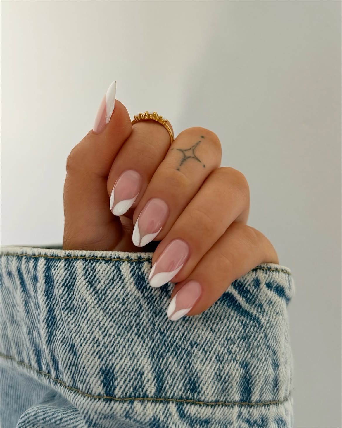 Chic White Curved French Tip Almond Nails
