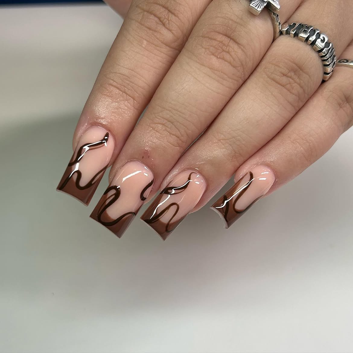 Chocolate Swirl French Tip Coffin Nails