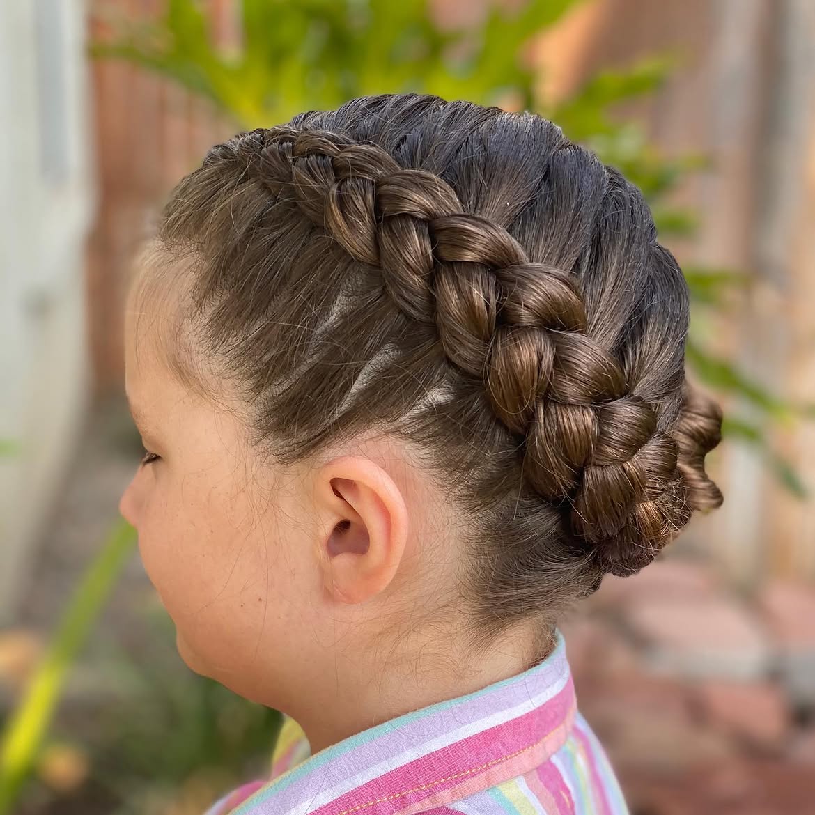 Classic Double Dutch Braids Into Low Buns