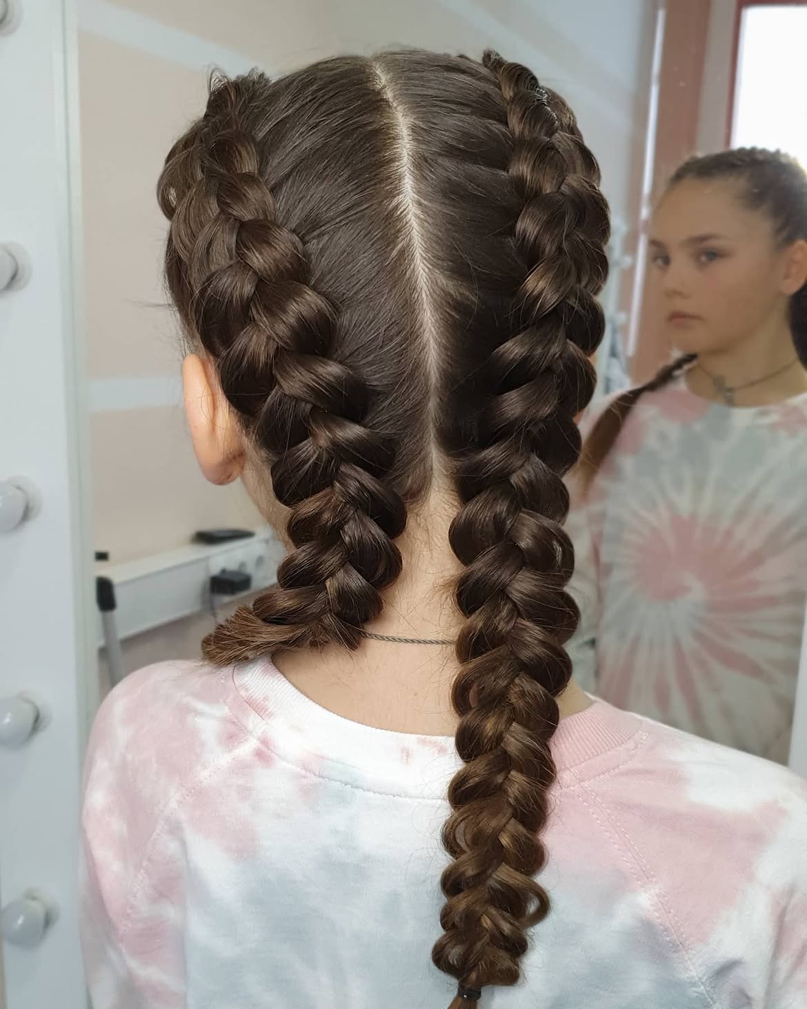 Classic Double French Braids On Dark Brunette Hair