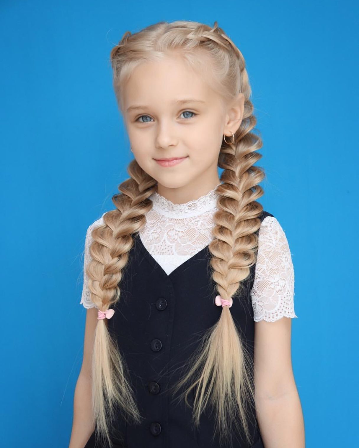 Classic Double French Braids On Light Blonde Hair