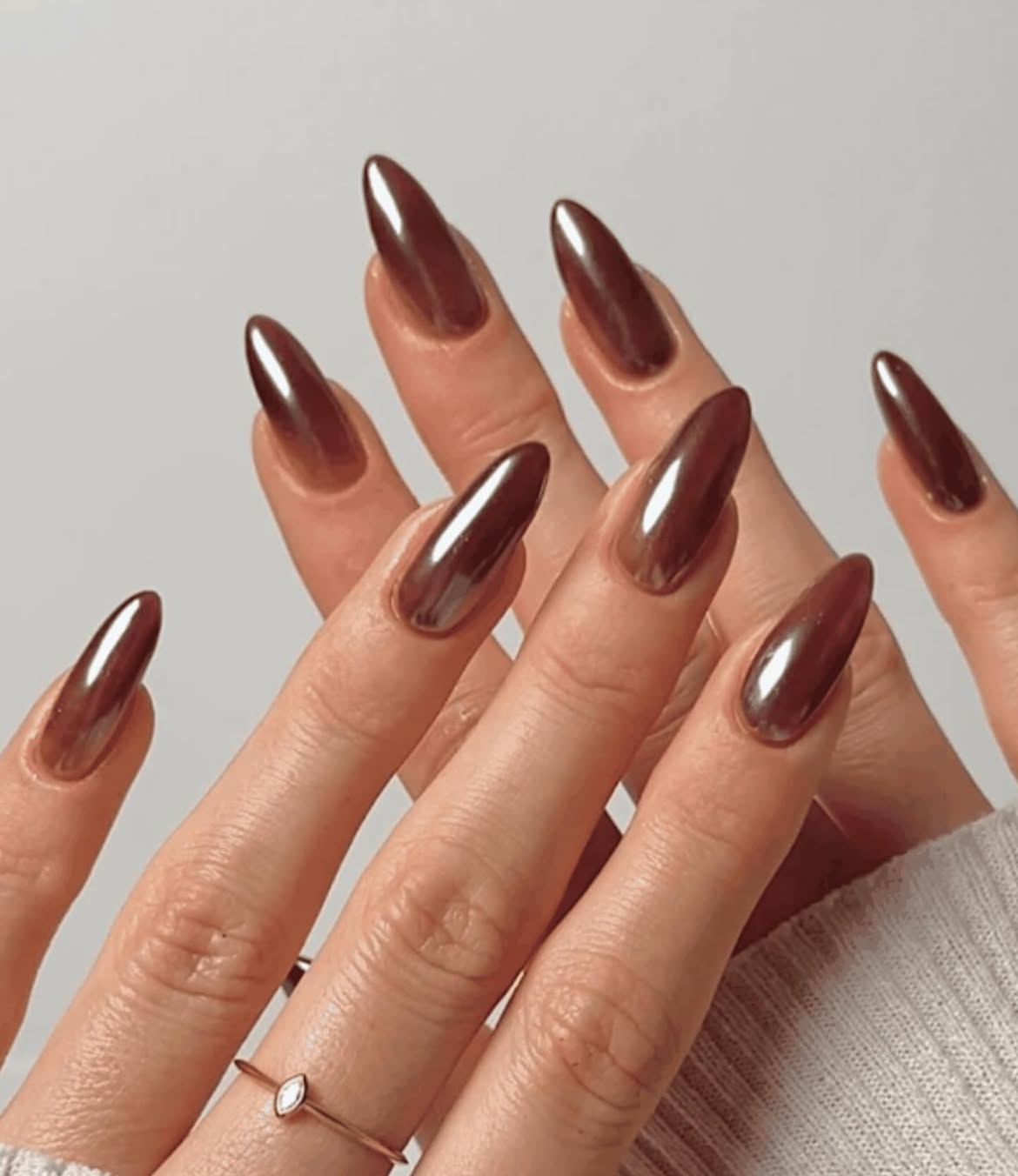 Deep Brown Chrome Almond Nails