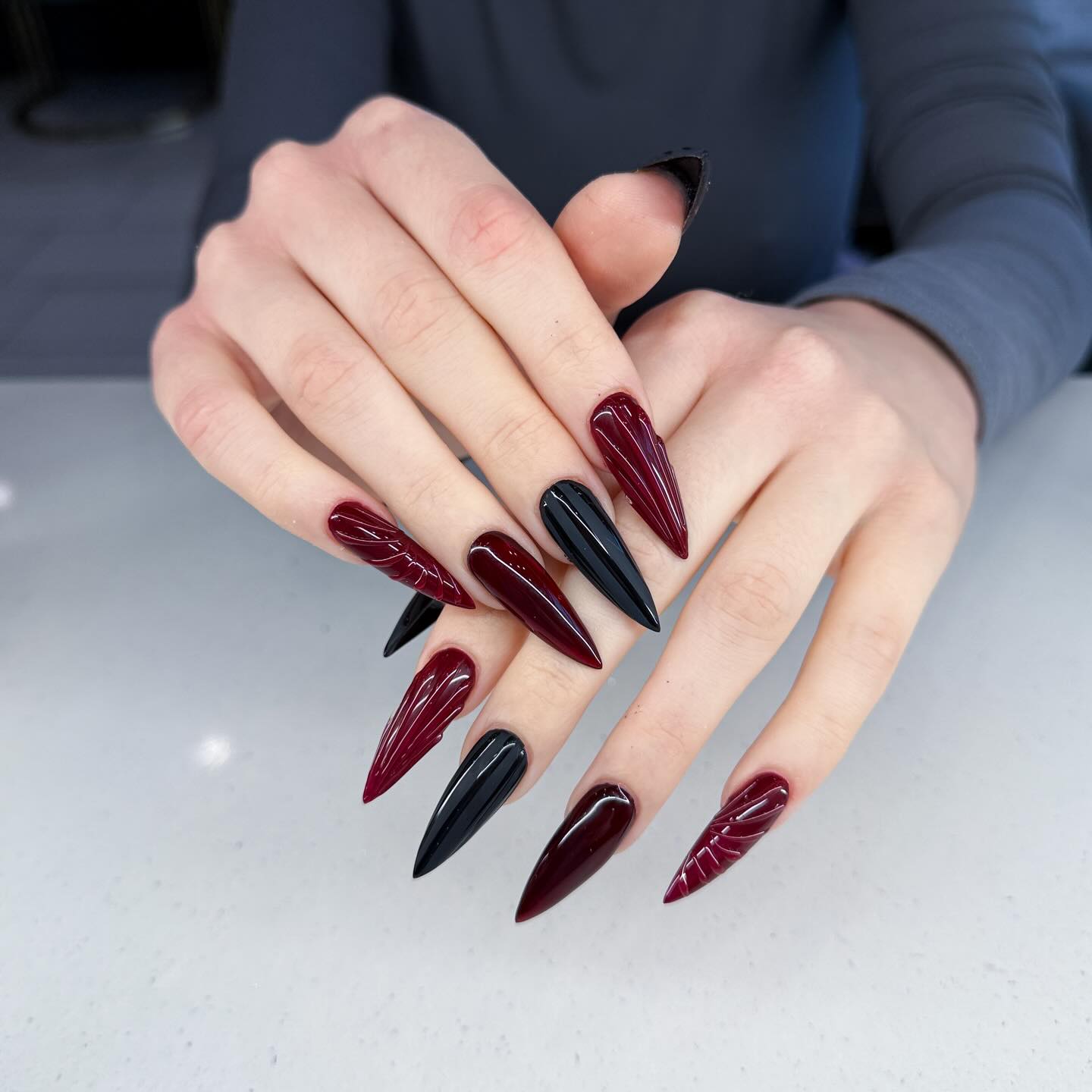 Deep Burgundy and Black Stiletto Nails